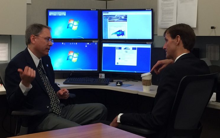 Glenn Rolph and RDML Gallaudet viewing and discussing HYSPLIT simulations