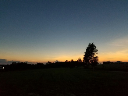 Landscape in shadow during eclipse totality