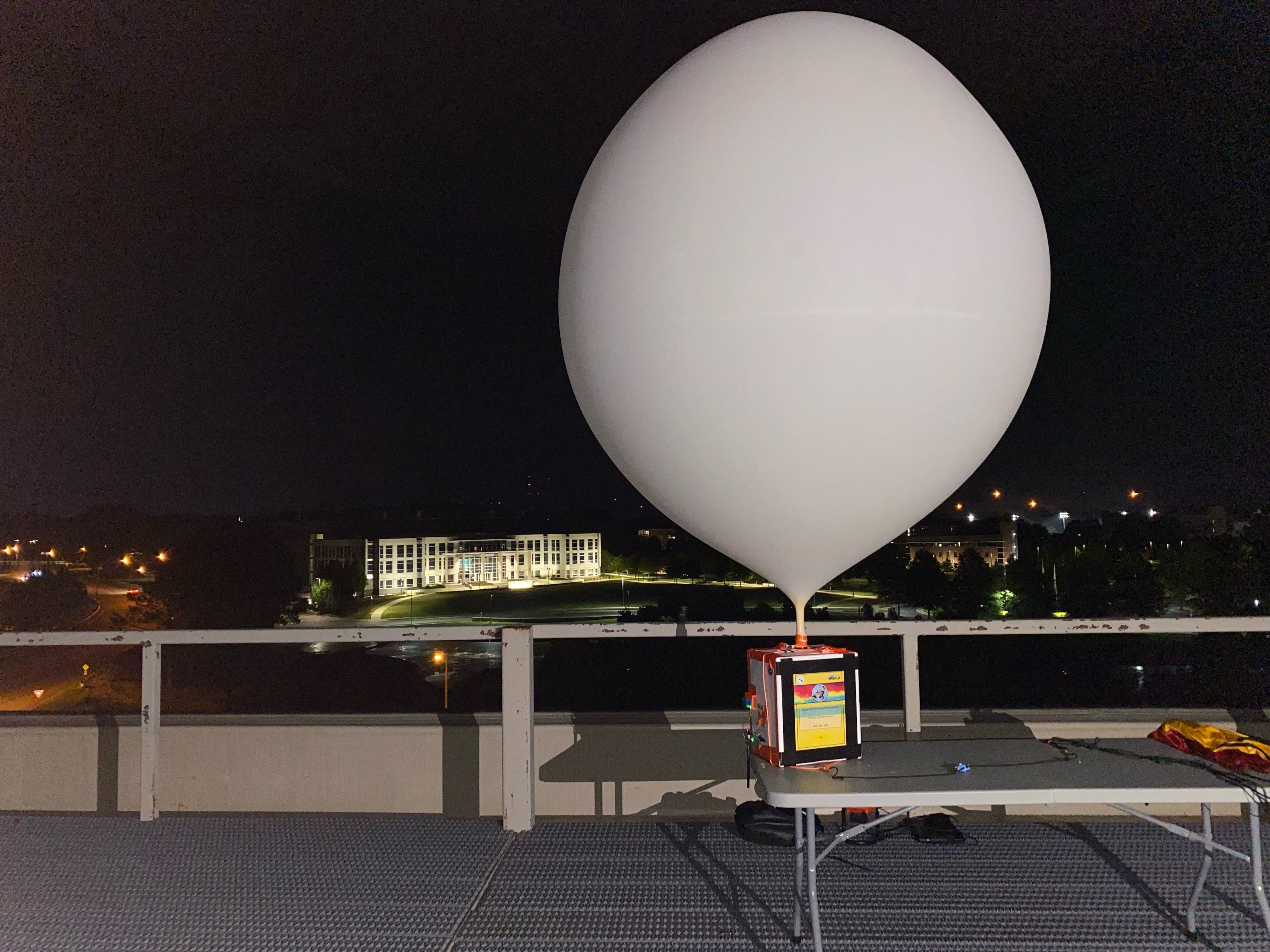 Balloon inflation on balcony overlooking uah campus.