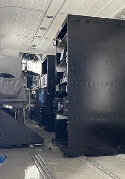 two racks of instruments inside the empty cabin of a small airplane