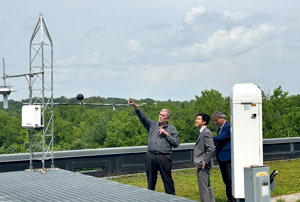 Advisor Visit News Page Harold Diamond talks about the instruments on one of five UrbanNet towers in the DC Area. Credit: Tracey Bien-Aimé, NOAA/ORAU