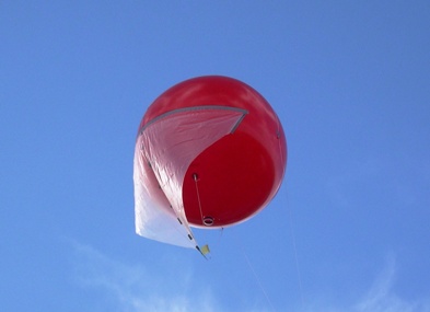 ARL-designed balloon installed with a sail to increase ability of the balloon to track the wind speed more closely and increase the balloon lift as ballast line goes into the water