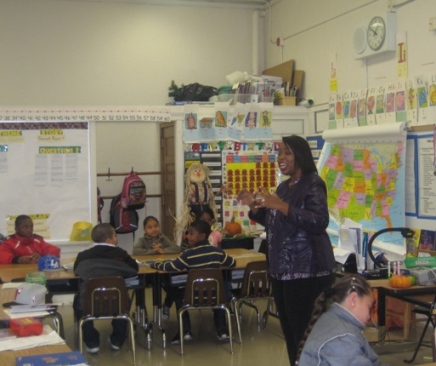 LaToya Myles speaking to students at Maxwell Park Elementary School